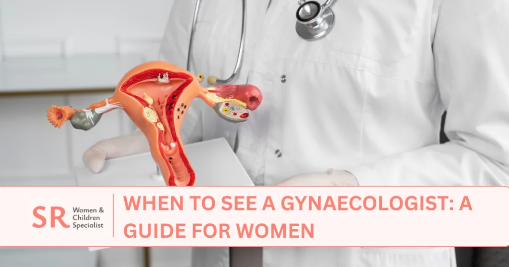 female gynaecologist holding a female anatomy model